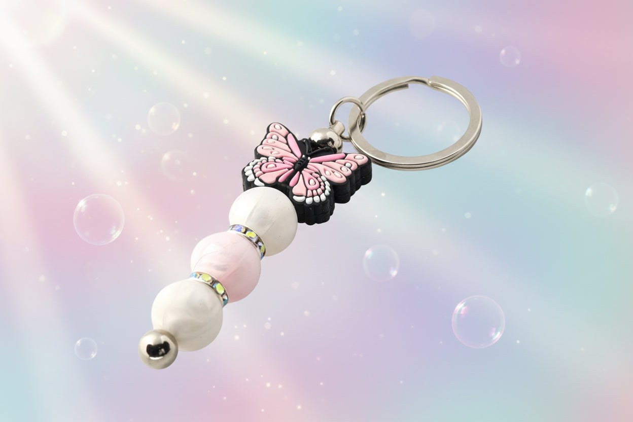 Keychain with pink butterfly and pink and white beads and sparkly rondelles