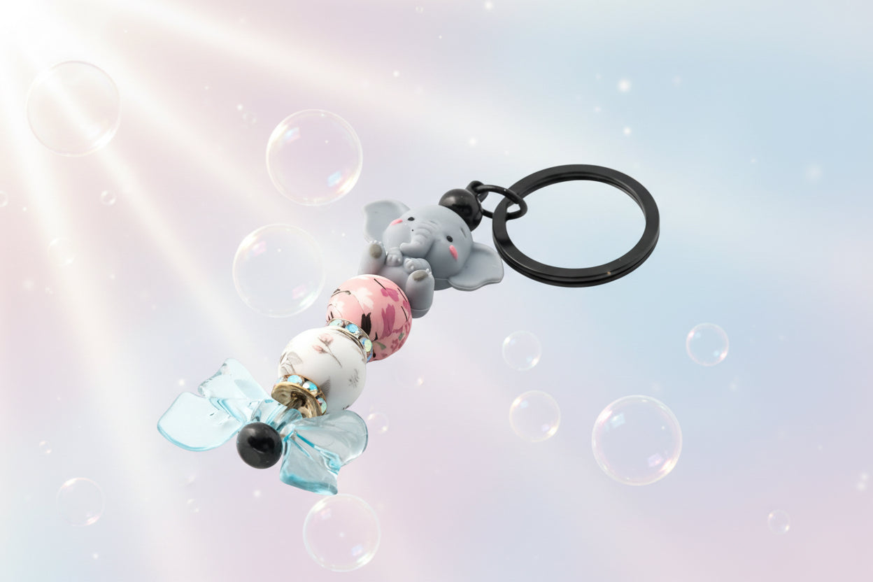 Elephant and Bow keychain with pink and white beads and sparkly rondelles