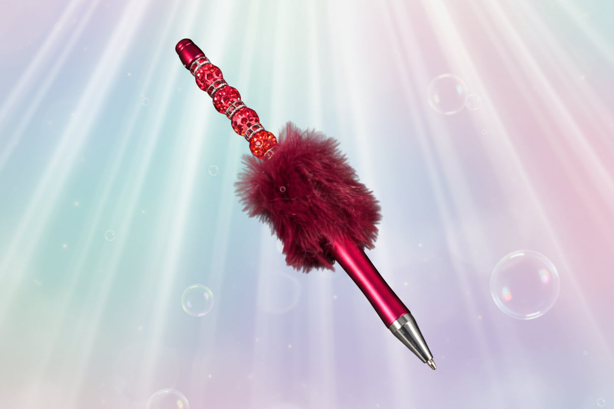 Whether you're jotting down notes, signing documents, or journaling your thoughts, this charming dark blue fluffy beaded pen brings a smile to every stroke