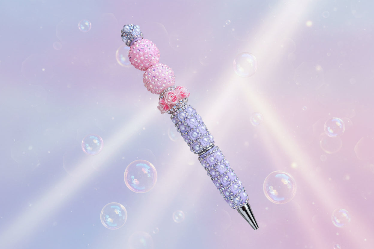 Pink and purple plush beaded ballpoint pen with smooth black ink. Tactile, stylish & perfect for gifts. Add personality to your writing at Georgie's Grove.