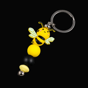 Whether you're keeping track of your keys or adding flair to your favourite bag, this cheerful bee keychain brings a pop of colour and charm to your daily routine.