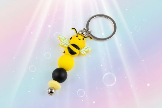 Whether you're keeping track of your keys or adding flair to your favourite bag, this cheerful bee keychain brings a pop of colour and charm to your daily routine.