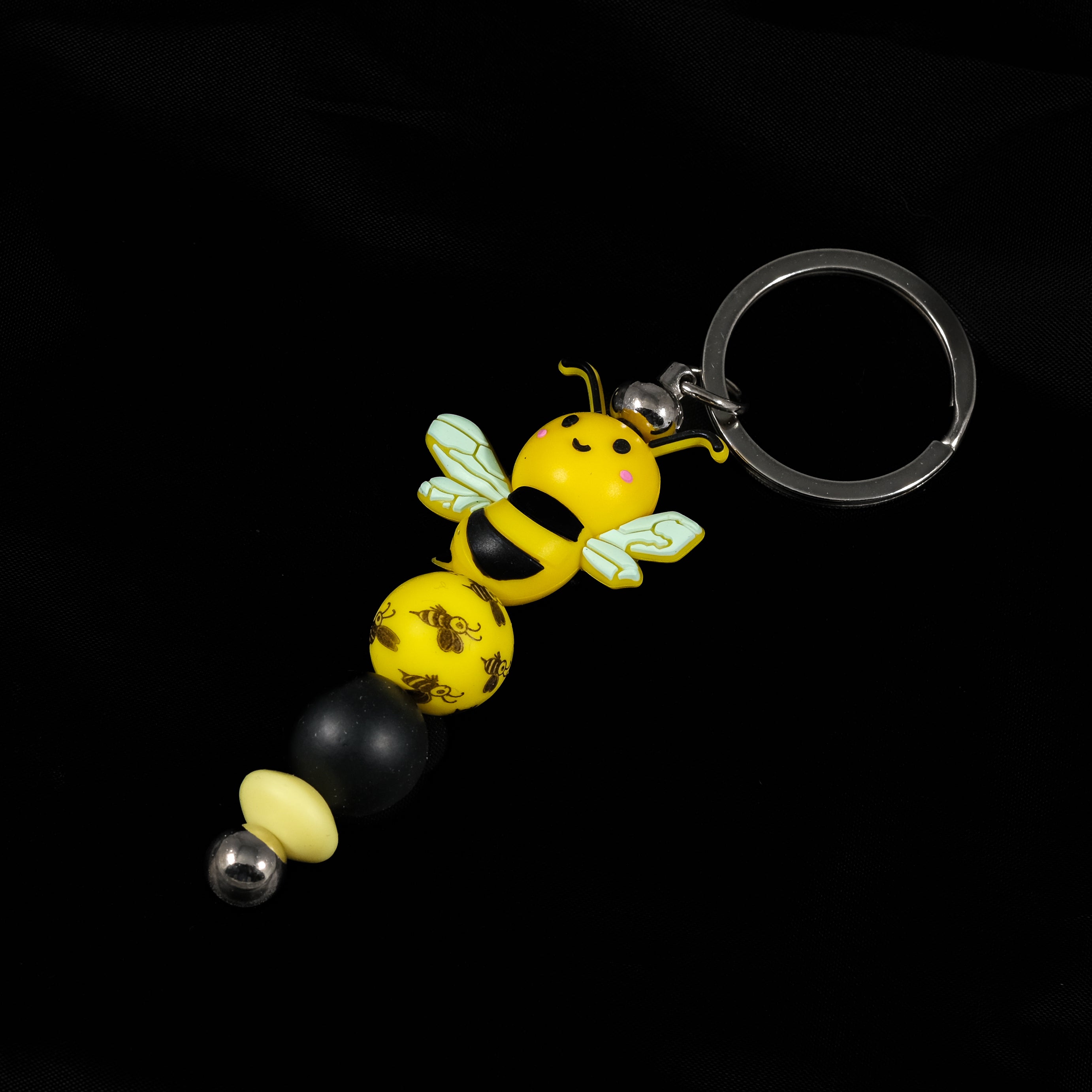 Whether you're keeping track of your keys or adding flair to your favourite bag, this cheerful bee keychain brings a pop of colour and charm to your daily routine.