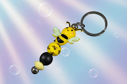 Whether you're keeping track of your keys or adding flair to your favourite bag, this cheerful bee keychain brings a pop of colour and charm to your daily routine.
