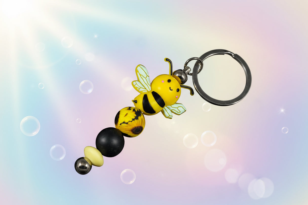 Whether you're keeping track of your keys or adding flair to your favourite bag, this cheerful bee keychain brings a pop of colour and charm to your daily routine.