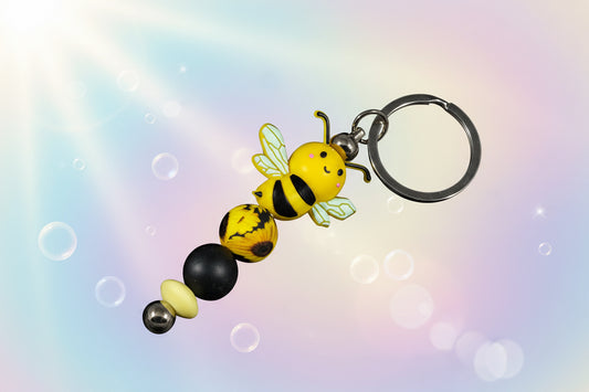 Whether you're keeping track of your keys or adding flair to your favourite bag, this cheerful bee keychain brings a pop of colour and charm to your daily routine.