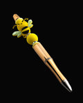 Gold pen with yellow stackable beads with sparkly rondelles and a bee shaped bead