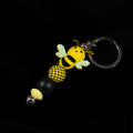 Whether you're keeping track of your keys or adding flair to your favourite bag, this cheerful bee keychain brings a pop of colour and charm to your daily routine.