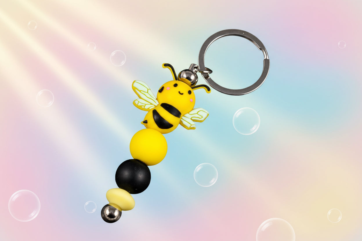 Whether you're keeping track of your keys or adding flair to your favourite bag, this cheerful bee keychain brings a pop of colour and charm to your daily routine.