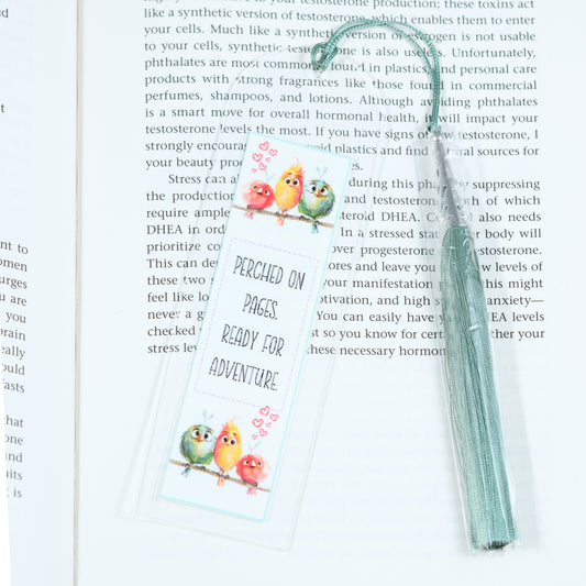 Acrylic bookmark with cute cartoon birds and inspirational quote 'Perched on pages. Ready for adventure'. Perfect gift for book lovers. Durable, lightweight design from Georgie's Grove