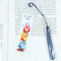 Acrylic bookmark with cute cartoon birds and inspirational quote 'Wild about reading'. Perfect gift for book lovers. Durable, lightweight design from Georgie's Grove