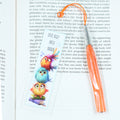 Acrylic bookmark with cute cartoon birds and inspirational quote 'Dive deep into books'. Perfect gift for book lovers. Durable, lightweight design from Georgie's Grove