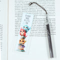 Acrylic bookmark with cute cartoon birds and inspirational quote 'So many books, so little time'. Perfect gift for book lovers. Durable, lightweight design from Georgie's Grove