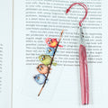 Add a splash of whimsy to your reading with this delightful Crazy Birds on a Branch acrylic bookmark! Featuring a playful design of quirky, characterful birds perched along a branch, this bookmark brings personality and charm to every page you turn.