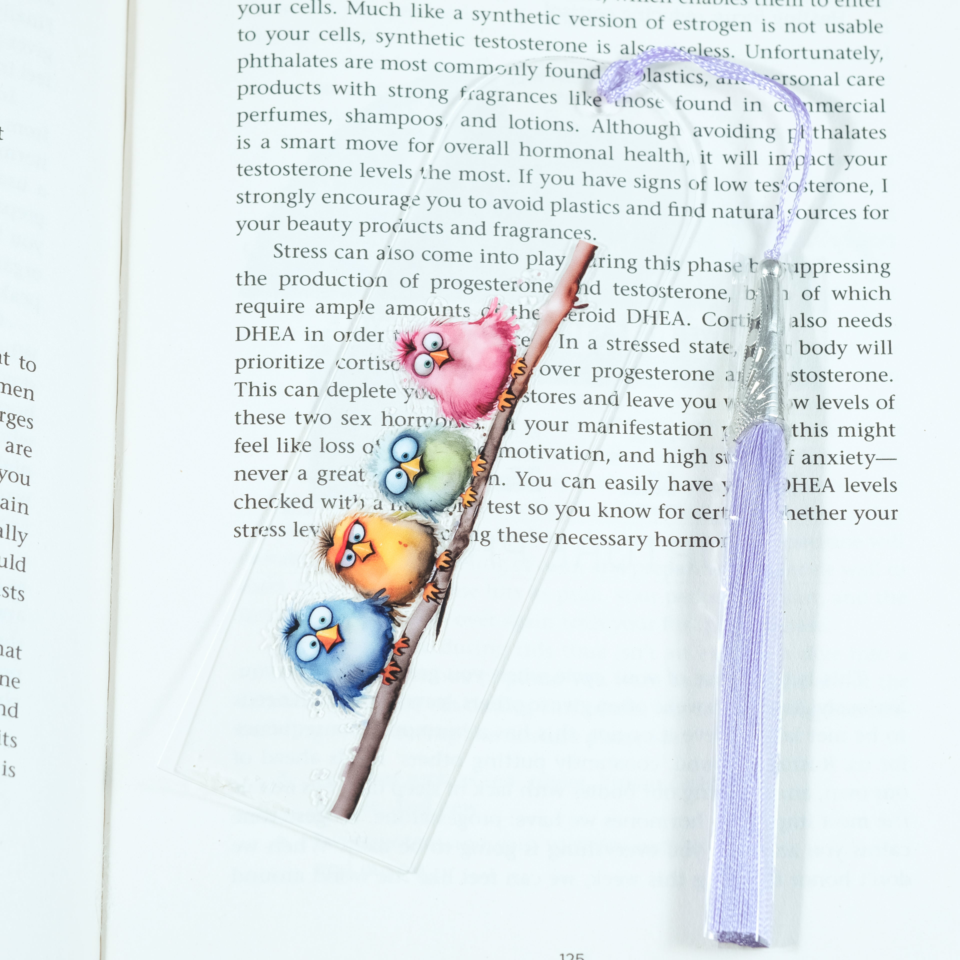 Add a splash of whimsy to your reading with this delightful Crazy Birds on a Branch acrylic bookmark! Featuring a playful design of quirky, characterful birds perched along a branch, this bookmark brings personality and charm to every page you turn.