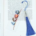 Add a splash of whimsy to your reading with this delightful Crazy Birds on a Branch acrylic bookmark! Featuring a playful design of quirky, characterful birds perched along a branch, this bookmark brings personality and charm to every page you turn.