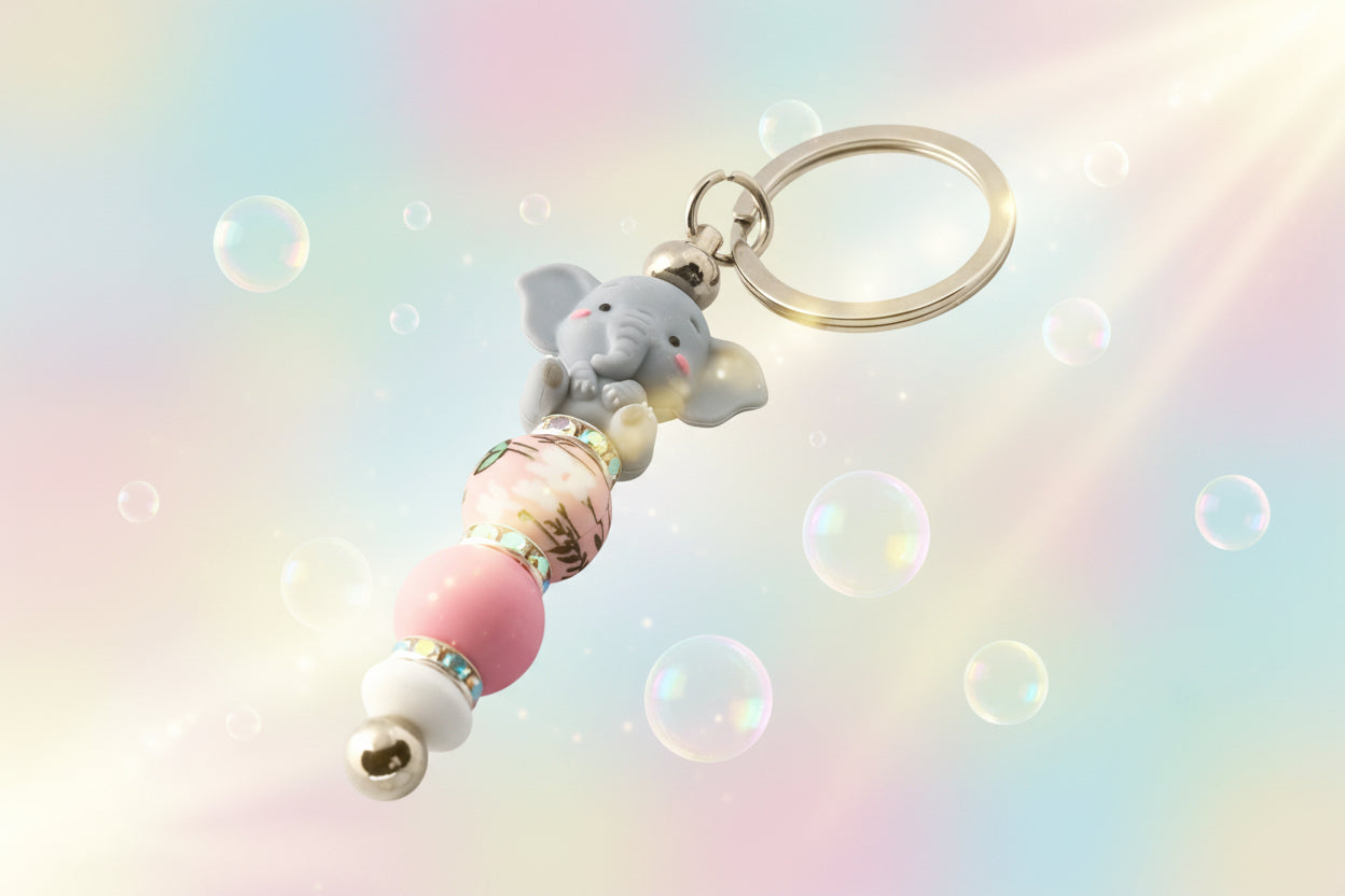 Elephant charm keyring with pink and white silicon beads and sparkly rondelles
