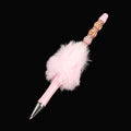 Whether you're jotting down notes, signing documents, or journaling your thoughts, this charming pink fluffy beaded pen brings a smile to every stroke