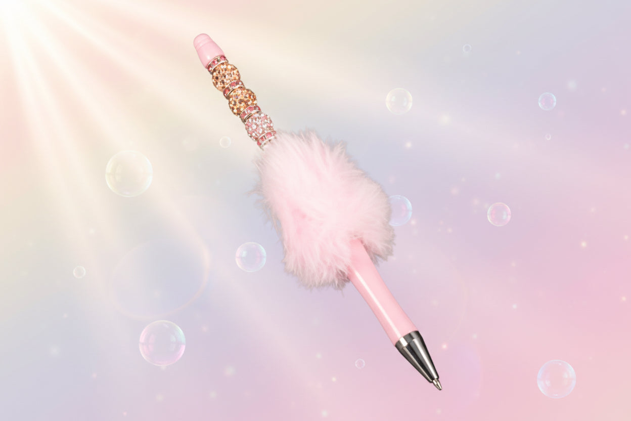 Whether you're jotting down notes, signing documents, or journaling your thoughts, this charming pink fluffy beaded pen brings a smile to every stroke