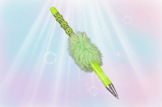 Whether you're jotting down notes, signing documents, or journaling your thoughts, this charming green fluffy beaded pen brings a smile to every stroke