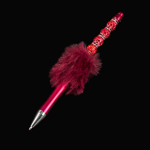 Whether you're jotting down notes, signing documents, or journaling your thoughts, this charming dark blue fluffy beaded pen brings a smile to every stroke