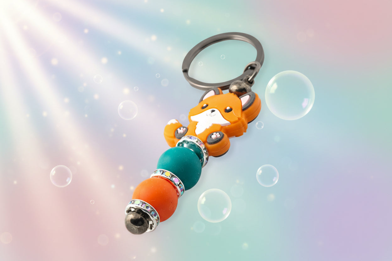Fox charm keychain with green and orange bead with sparkly rondelles