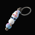 Blue Gnome charm keychain with blue and white beads&nbsp;