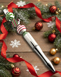 A Metallic silver pen with wooden candy cane beads with a Xmas theme